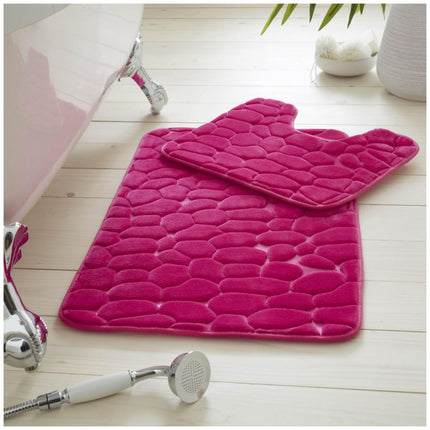 Enhance your bathroom with the PEBBLE BATH MAT. This ultra soft, water absorbent set is designed with a cube memory foam core and anti-slip backing for comfort and safety. Transform your bathroom with a touch of sophistication with its pink color.