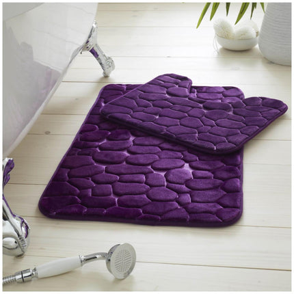 This PEBBLE BATH MAT set is perfect for those looking for a luxurious bath experience. It features a soft, water absorbent memory foam construction with anti-slip cube patterns and a stylish purple color. Enjoy safe and comfortable bathing with superior water absorption.