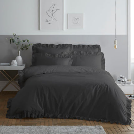 The RUFFLE Duvet Cover Set is perfect for a luxurious bedroom. A simple charcoal color lends itself to any aesthetic, while soft polycotton fabric and ruffle detailing offer beautiful comfort and style. Add a touch of sophistication to your bedroom with this elegant duvet cover.