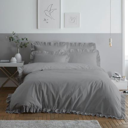 This RUFFLE Duvet Cover Set provides superior comfort with its polycotton fabric. Its grey color enhances a contemporary style, making it easy to match with a variety of bedroom decors. Enjoy a great sleep experience with its breathable fabric.