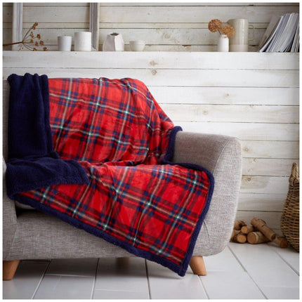 Bring a touch of contemporary style to your home decor with this luxurious Sherpa blanket. In a striking navy and red colour, this double-sided throw is perfect for adding a finishing touch to beds, sofas and chairs. Crafted from ultra-soft fabric, it’s perfect for snuggling up in comfort and warmth.