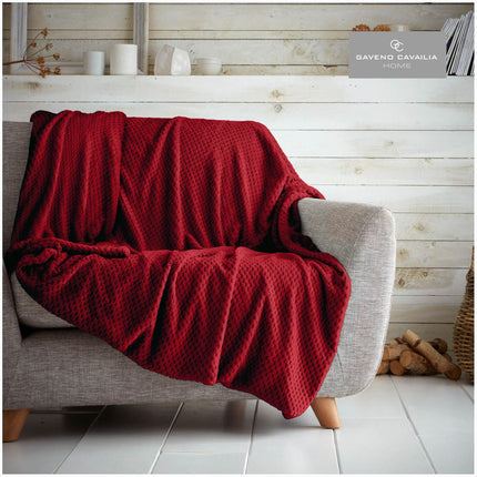 This red POP CORN THROW is perfect for cozying up whilst traveling. Crafted with super soft and hypoallergenic materials, this machine washable throw is both colorfast and durable. Wrap yourself up in luxury with this one-of-a-kind travel throw.