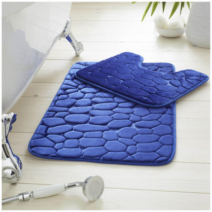 Stay safe and comfortable in the bath with this PEBBLE BATH MAT set. Crafted from ultra-soft memory foam with a unique cube design, this mat is water absorbent and features an anti-slip base for optimal stability. Enjoy luxury and safety with this royal blue mat set.