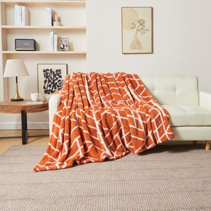 ELY GEO is a soft and cosy blanket that provides premium quality and comfort. This charcoal throw with rust color ensures that colors are colorfast and won’t bleed, making it hypoallergenic and skin-friendly. Perfect for any room in your home.