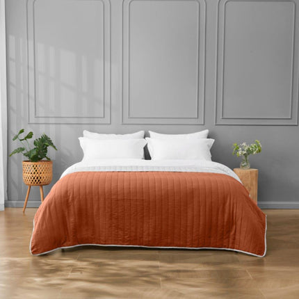 Our Pinsonic Bed Spread is a perfect accent to enhance your home decor. It features a reversible design with a rust and grey color that looks great in any living room, bedroom, or guest room. Its velvet-like finish and pinsonic stitching provide a luxurious feel that you won’t want to miss.