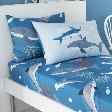 The SEA DINO SHARK Kids Fitted Bed Sheet is made with a soft, breathable cotton blend for added comfort. It features a stunning blue color with a fun shark print, perfect for any child's bedroom. With its superior quality and durability, the sheet is sure to last for years to come.