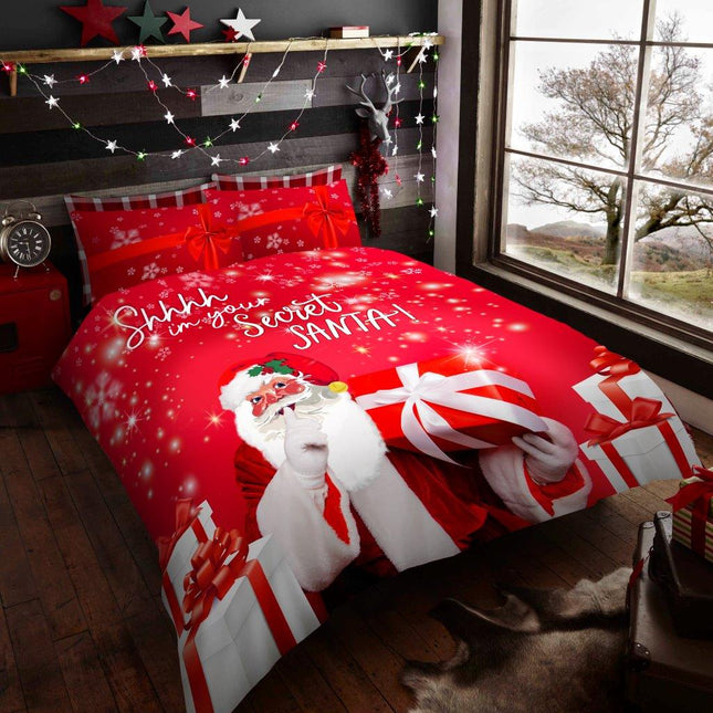 The SECRET SANTA Duvet Cover Set adds vibrant colors to your bedroom. This set includes a duvet cover in classic red that features a whimsical Christmas pattern. The soft fabric is easy to care for and designed to last for years to come. Transform your room with this unique and festive set.