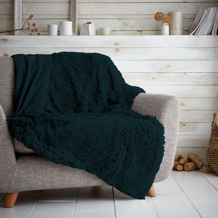 HUGG & SNUG is a premium teal-colored blanket crafted with a blend of soft, colorfast, and hypoallergenic fabrics for a warm and cosy experience. Enjoy ultimate comfort and a luxurious feel every time.