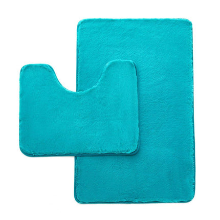 This FAUX FUR BATH MAT gives you a luxurious spa experience at home. Constructed with high quality material and extra long pile, this mat is anti-slip, water absorbent, hypoallergenic, and long-lasting. Machine washable for easy cleaning. Available in teal.