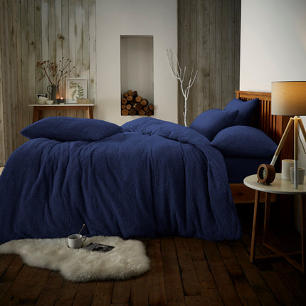 The Teddy PLAIN duvet cover set is made of 100% polyester and features a durable navy color. Perfect for everyday, this set offers a sophisticated look and feel perfect for any bedroom. Lay yourself down on this exceptionally soft fabric and feel the luxury you deserve.