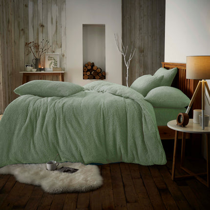 Complete your bedding look with this classic Teddy Plain Duvet Cover Set in a rich sage green color. Crafted from a lightweight and smooth 100% Polyester, this set includes a duvet cover and pillowcase to enhance any bedroom. Machine washable for easy care.