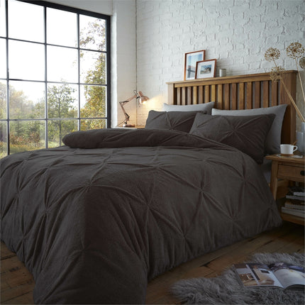 This luxurious CHISWICK PINTUCK Duvet Cover Set from TEDDY is crafted from a of superior polyester for an irresistibly soft feel. It features an elegant charcoal color and a stylish pintuck design for a classic look that will provide a cozy night's rest.