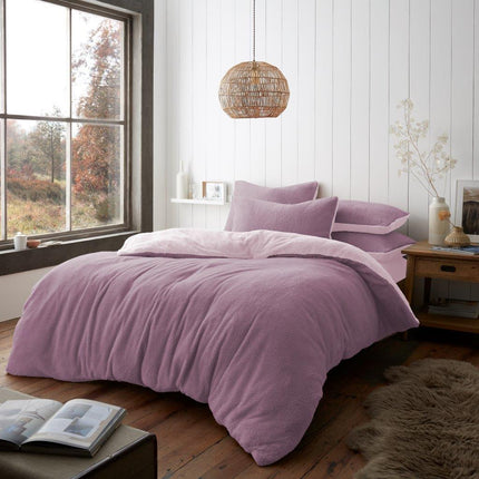 The REVERSIBLE Duvet Cover Set features a reversible design with bold pink and light pink colors, making it a stylish and versatile addition to any bedroom. The set is made of high quality,  polyester fabric, designed to stay soft and cozy for a comfortable restful night's sleep.