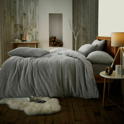 This PLAIN Teddy Duvet Cover Set is the perfect addition to any bedroom! Its soft teddy fabric is the perfect combination of comfort and luxury, while its silver color adds a touch of sophistication. Perfect for a restful night's sleep.