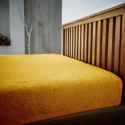 TEDDY PLAIN Fitted sheet in ochre color is tailored to fit all standard mattresses. It has 4 way stretch to ensure a secure fit, and is fade resistant for long lasting use. Enjoy a soft and smooth sleeping experience.