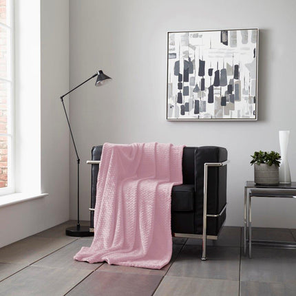 The WAVE Throw is made with premium and hypoallergenic materials, providing the perfect cozy accessory for chilly days. Enjoy the luxurious feel of this blanket and the vibrant Blush Pink color. Long-lasting and colorfast, it's perfect for every season.