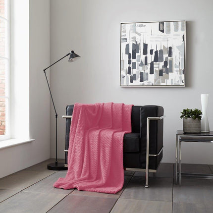 Experience luxurious comfort with the WAVE Throw. Constructed from soft and hypoallergenic materials, this cozy blanket provides premium insulation on chilly days. With superior colorfastness and a delicate Rose hue, relax in warmth and style.