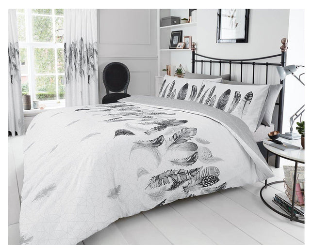 This Feather Printed Duvet Cover Set adds a modern twist to your bedroom decor. Printed with crisp white color, the soft fabric provides a luxurious look and feel. The durable set is made from polycotton for a long lasting lifespan. Transform your room with sophistication and style.