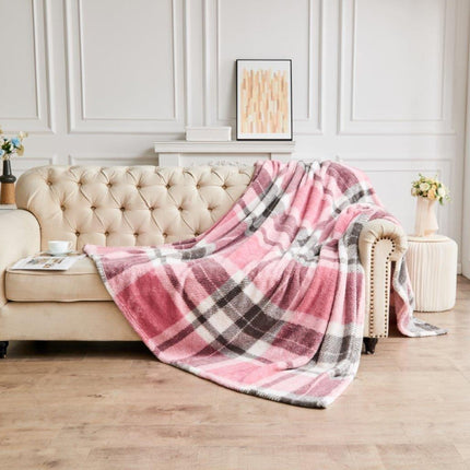 Experience bedroom luxury with this beautiful TEDDY WINDSOR CHECK Throw. Crafted with ultra-soft teddy fleece fabric, this plush bedding indulges you with the perfect combination of luxurious softness and long-lasting durability. The blush pink color will brighten up any room. Enjoy ultimate comfort and warmth with this beautiful throw.