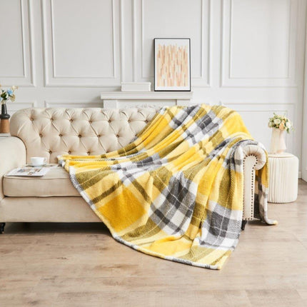 The TEDDY WINDSOR CHECK is made with a luxurious combination of plush yet durable fleece fabric which offers incredible comfort and warmth. With its ochre color and soft touch finish, this throw is sure to add a cozy and stylish touch to any living space.