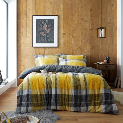 The WINDSOR CHECK Duvet Cover Set provides a stylish and practical approach to bedroom décor. Offering superior comfort with its Windsor Check pattern, this lightweight bedding set is sure to provide a timeless addition to any bedroom. With an ochre color, this set is sure to bring warmth and coziness to any setting.