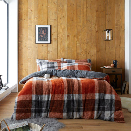 Treat yourself to the soft and cozy comfort of a WINDSOR CHECK Duvet Cover Set. Constructed from premium Teddy Windsor Check fabric with a rust color tone. This duvet cover set provides a luxurious sleeping experience. Enjoy the satisfaction of a high quality set that will last.