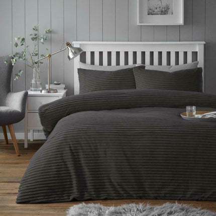 This CHUNKY RIB Teddy Duvet Cover Set is perfect for luxe bedding. Made from a super soft fabric with a charming rib texture, this charcoal color duvet set adds texture and style to any room. The cozy feel and timeless design ensures a restful sleep every night.