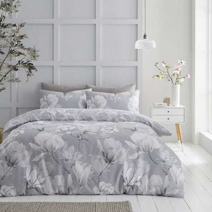 The MAGNOLIA DREAM Duvet Cover Set offers a luxurious sleeping experience with its high quality polycotton fabric and grey color. Enjoy added comfort with its ultra soft feel and superior breathability. Create a timeless look for any bedroom décor.