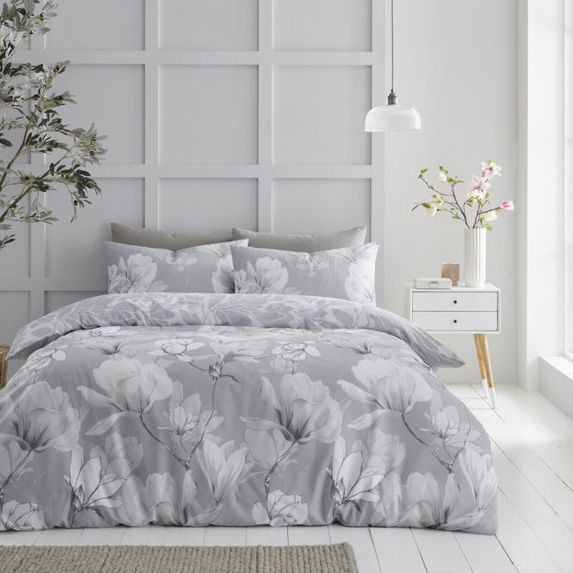 The MAGNOLIA DREAM Duvet Cover Set offers a luxurious sleeping experience with its high quality polycotton fabric and grey color. Enjoy added comfort with its ultra soft feel and superior breathability. Create a timeless look for any bedroom décor.