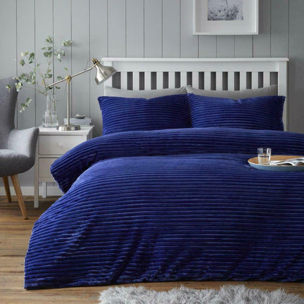 This CHUNKY RIB Teddy Duvet Cover Set is the perfect addition to any bedroom. The navy color is chic and timeless, adding a modern flair to any room. The chunky rib design adds a luxurious texture and feel, and the high thread count of the material ensures lasting comfort and quality. For a classic and timeless look, this duvet cover set is a must have.