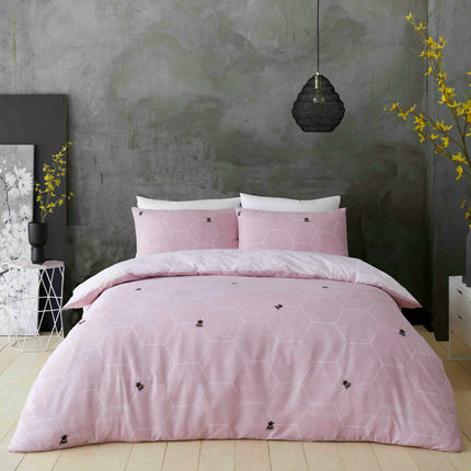 Experience blissful nights with this soft BEE HAPPY Duvet Cover Set, available in a luxurious blush pink color. Crafted from high quality polycotton, it's designed to keep you cozy and comfortable for many years. Enjoy hassle free laundering, thanks to its effortless care instructions. Enhance the look of your bedroom with this stylish duvet set.