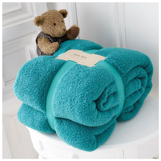 The TEDDY COLLECTION is a premium quality blanket featuring a hypoallergenic teddy bear collection throw in teal color. It is soft, machine washable at 30 degrees, and warm and cozy to keep you and your family comfortable all year round. Perfect for the UK Hot collection, this animatronic blanket is perfect for any home.